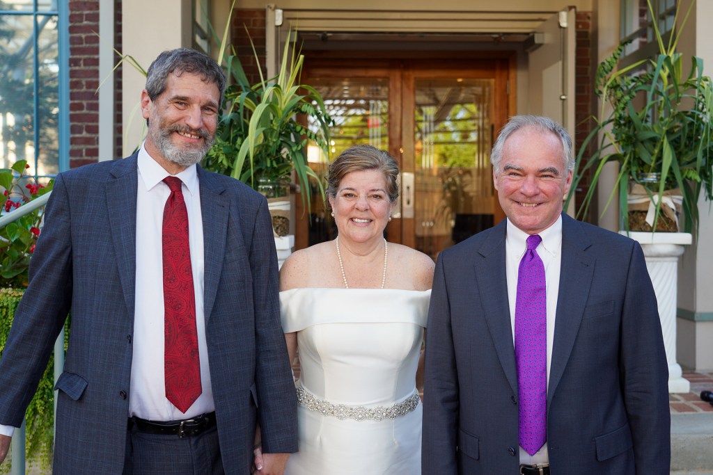 Husband Greg, me, and Senator Kaine